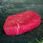 US Black Angus Hüftsteak, hochwertig präsentiert auf einer Schieferplatte für Gezer Kunden.