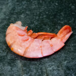 Argentinische Rotgarnelen (Wildfang), wirkungsvoll auf einer Schieferplatte präsentiert für Gezer Gastro-Kunden.